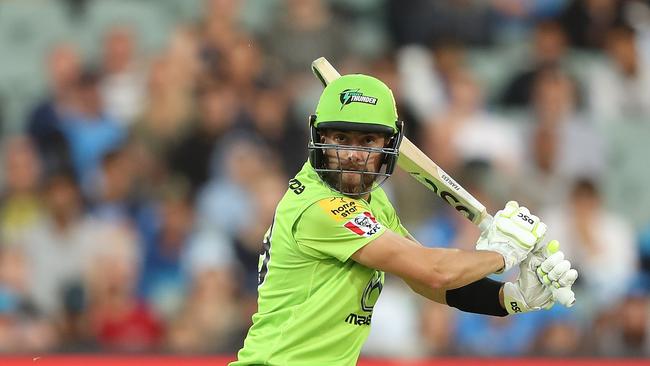 Alex Ross carves a cut shot to the fence for Sydney Thunder.