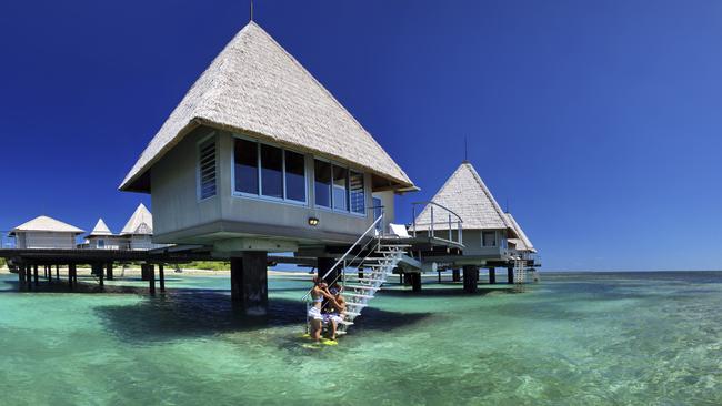 Overwater bungalows at L'Escapade Island Resort in New Caledonia.