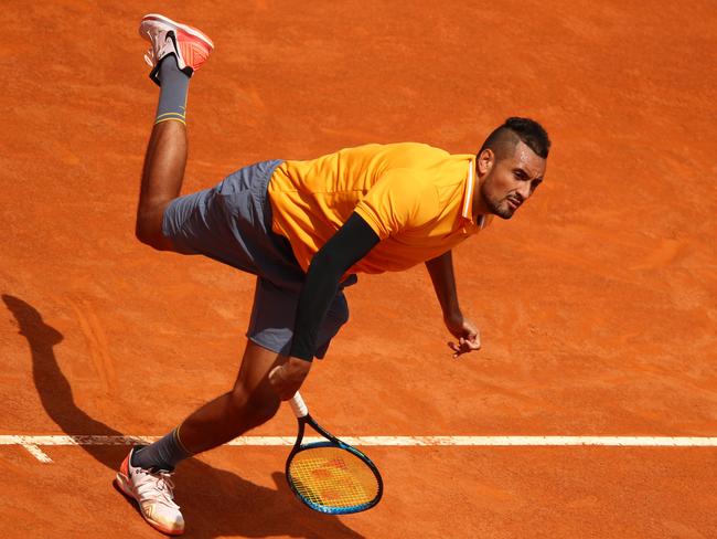 Nick Kyrgios of Australia serves to Daniil Medvedev on Tuesday. Picture: Getty Images