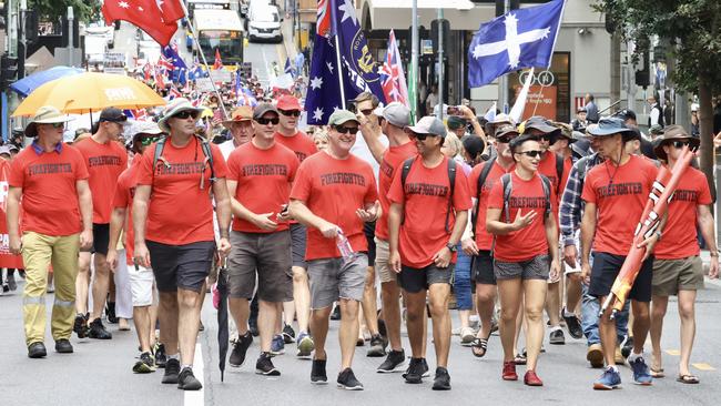 Firefighters march in the Brisbane CBD to protest vaccine mandates. Picture: Liam Kidston