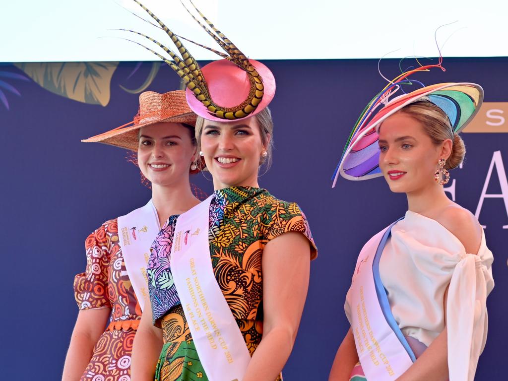 Mietta Russell, Hannah Burns and Jaimee Bruggemann win the 2021 Darwin Cup Fashions on the Field competition. Picture: Julianne Osborne