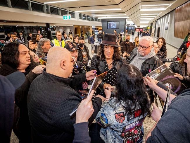 Paul Stanley signs autographs for fans upon arrival at Melbourne Airport to begin the Australian leg of the End of the Road Tour. Picture: Jake Nowakowski