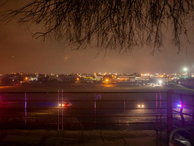 TOPSHOT - Vehicles of the US Border Police patrol along the Rio Bravo, natural border between Eagle Pass, Texas, US and Piedras Negras, Coahuila state, Mexico, as seen from Piedras Negras, on February 9, 2019. (Photo by Julio Cesar AGUILAR / AFP)