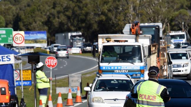 Police checking cars last week at the Queensland border with NSW at Stuart Street at Coolangatta. Picture: NCA NewsWire / Steve Holland