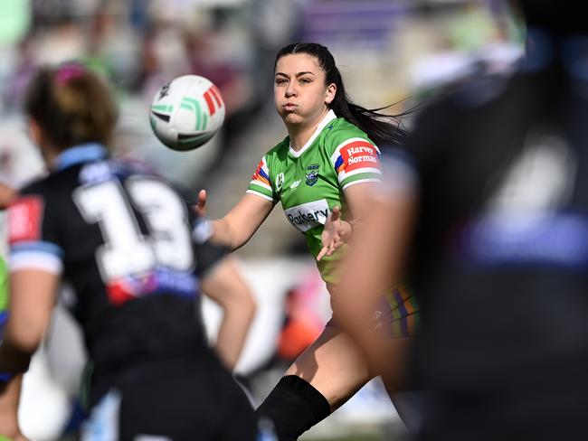 Green machine: Madison Bartlett takes the ball while in action for Canberra. Picture: NRL Images