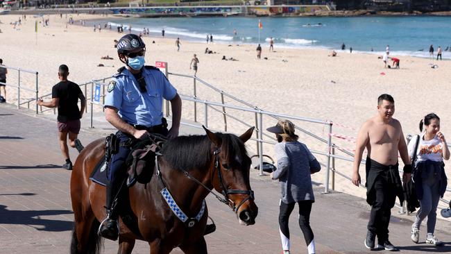 Mounted police patrol Bondi Beach during Sydney’s lockdown. Picture: NCA NewsWire / Damian Shaw