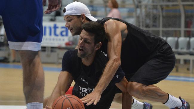 Grigor Dimitrov and Novak Djokovic playing basketball before the tournament.