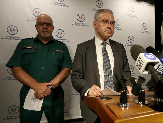 SAAS CEO David Place and Health Minister Stephen Wade. Picture: AAP Image/Kelly Barnes