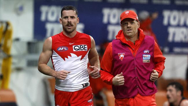 Jake Lloyd heads to the rooms for an HIA in the final quarter of the Sydney Derby. Picture: Phil Hillyard