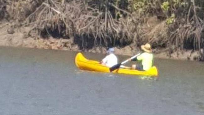 Lunatics canoe down croc-infested Buff Creek.