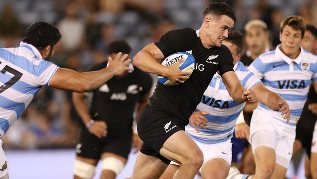 Will Jordan of the All Blacks makes a break to score a try during the 2020 Tri Nations match between the Argentina Pumas and New Zealand at McDonald Jones Stadium on Saturday. Picture: Cameron Spencer/Getty Images