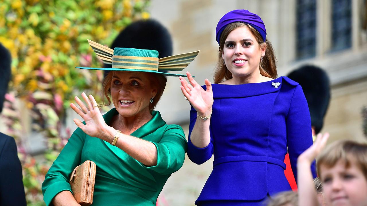 Sarah Ferguson, Duchess of York and Princess Beatrice of York attend the wedding of Princess Eugenie of York to Jack Brooksbank.