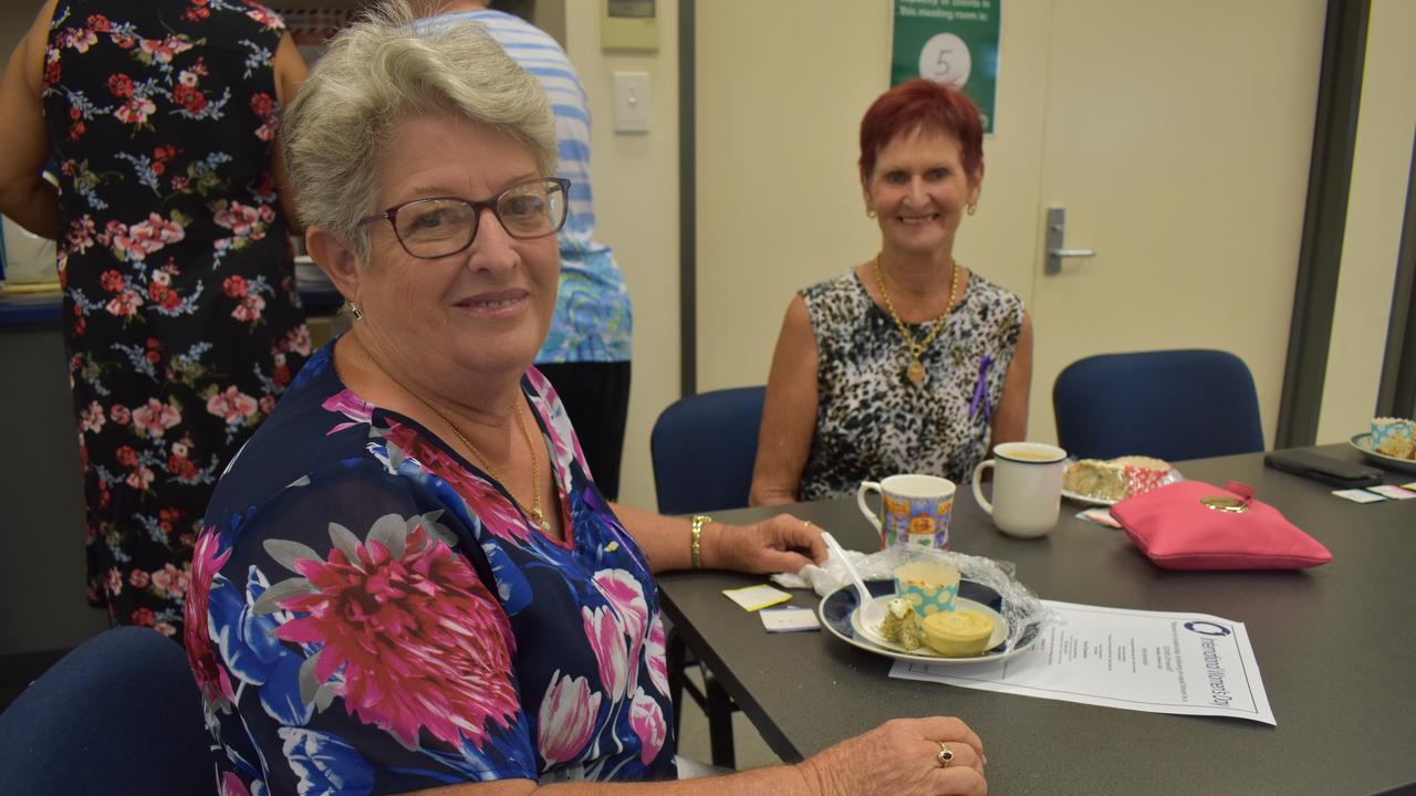 (L) Joan Boge and Pat Brady enjoy International Women's Day Morning Tea at the Maryborough Neighbourhood Centre.