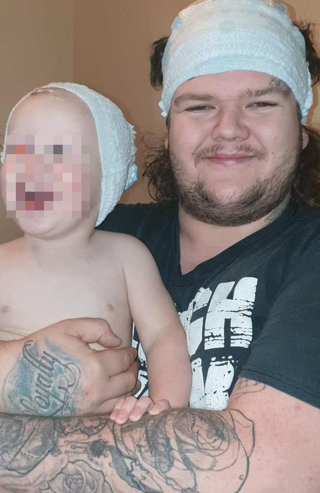 Alleged Burnie murder victim Bobby William Medcraft, 23, pictured with his young son. Picture: Facebook