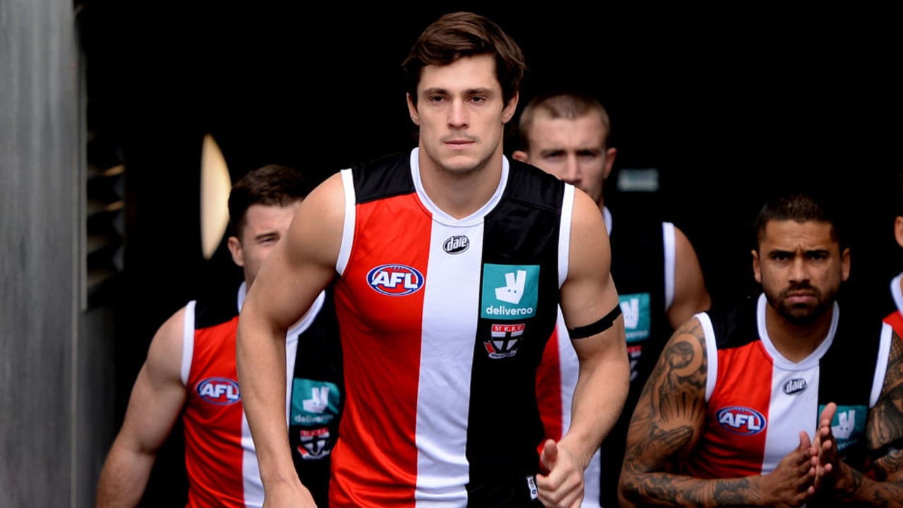 HOBART, AUSTRALIA - AUGUST 22: Jack Steele of the Saints leads out the team during the round 23 AFL match between St Kilda Saints and Fremantle Dockers at Blundstone Arena on August 22, 2021 in Hobart, Australia. (Photo by Steve Bell/AFL Photos via Getty Images)