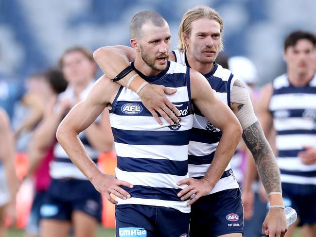 Sam Menegola (left) felt knee soreness after playing against Hawthorn. Picture: Kelly Defina/Getty Images