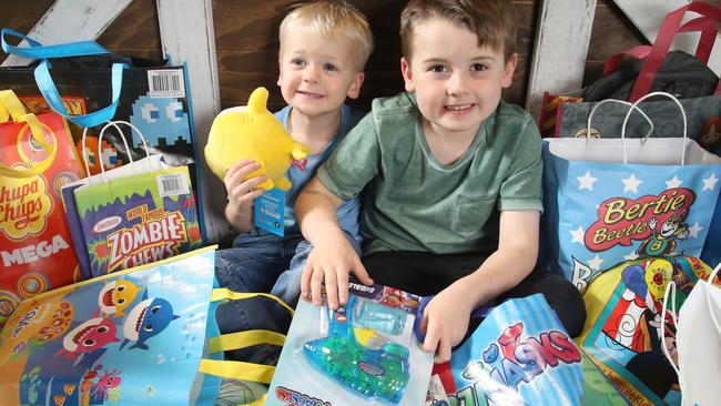 Royal Adelaide Show – Harvey, 6, and Emmett Lovell reviewing some of this year's showbags. Picture Dean Martin