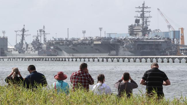 People gather at Myrtletown Reserve to have a look at the USS Ronald Reagan. Picture: Peter Wallis