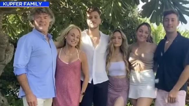 Brianna Kupfer (centre right) with her family.