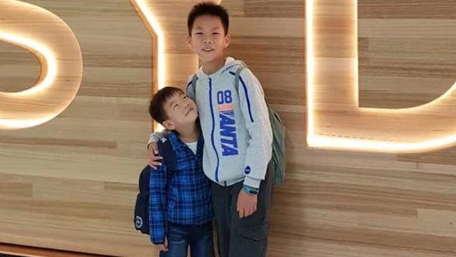 Andrew and Thomas Zhu, who are trapped in Wuhan, China.