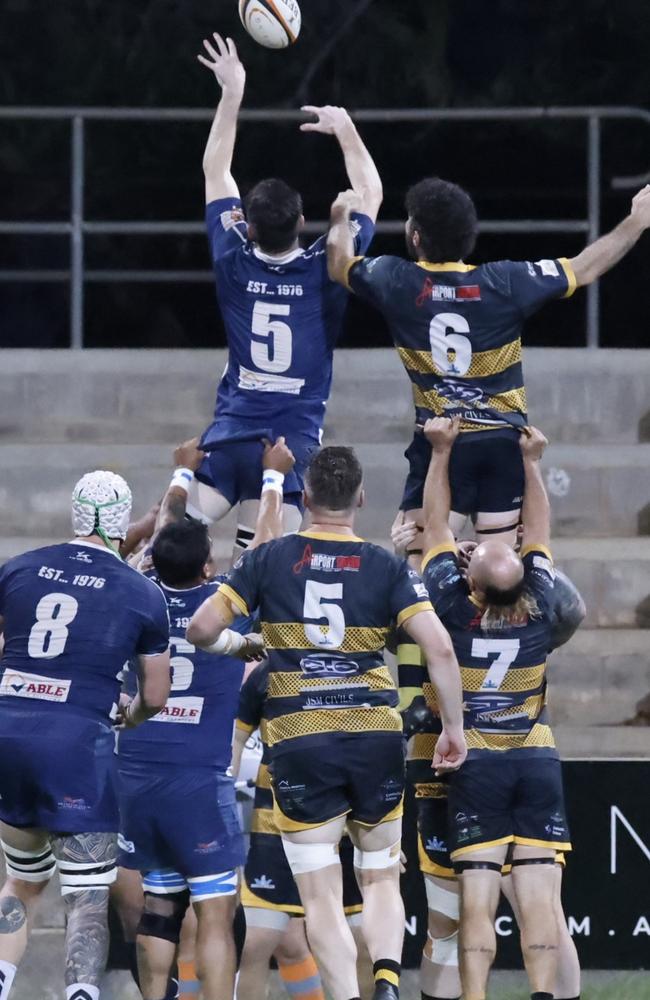 Casuarina Cougars James Cardwell (blue no. 5) contesting a lineout in the A-grade match against Darwin Dragons. Picture: From The Sideline Sports Photography.