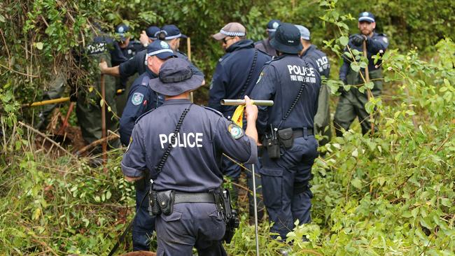 Police searching at Batar Creek 4km from where he disappeared. Picture by Peter Lorimer.