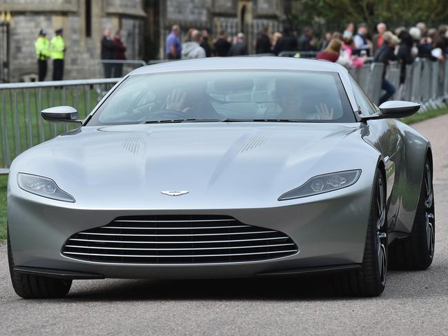 007-style! The newlyweds left Windsor Castle in an Aston Martin DB10. Picture: Getty Images