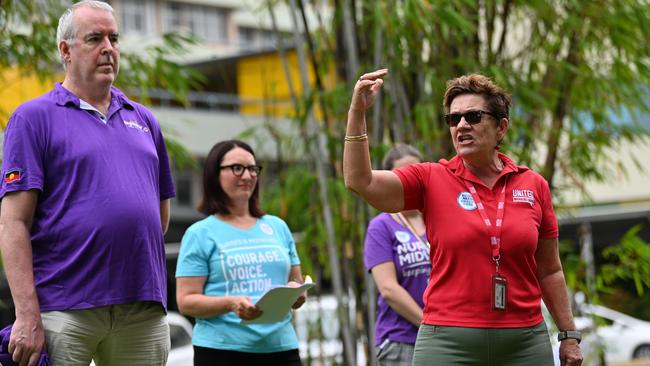 Trish Berrill of the United Workers Union addresses the rally gathered outside the Cairns Hospital. Picture: Emily Barker