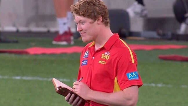 Matt Rowell takes notes during his injury layoff.