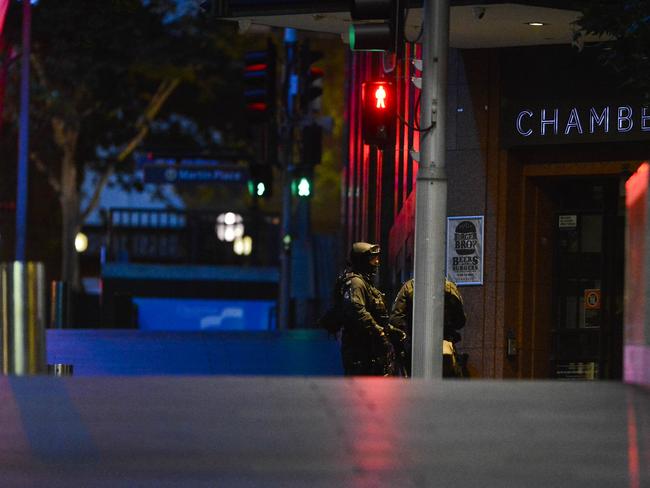 Police during the evening of the siege. Picture: Chris McKeen