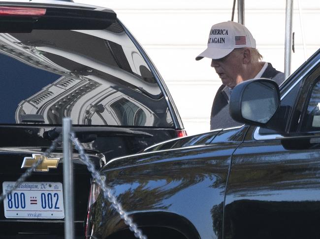 President Donald Trump pictured flanked by his motorcade on the South Lawn of the White House on November 8. Picture: AFP