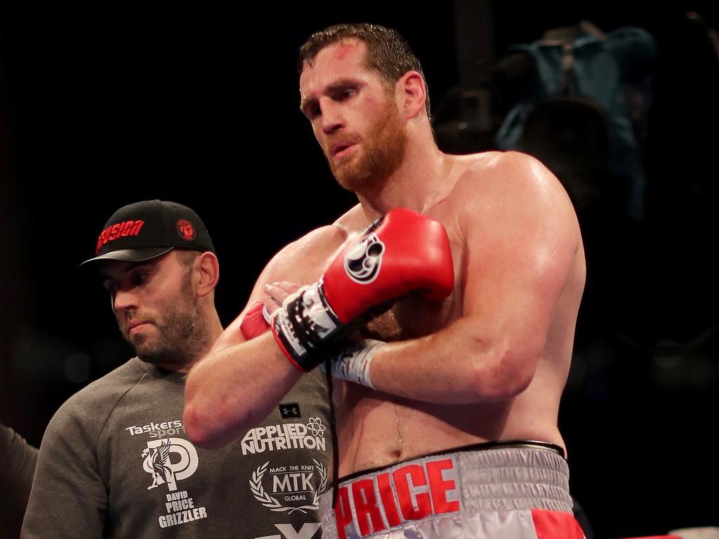 David Price holds his injured left bicep. (Photo by Richard Heathcote/Getty Images)