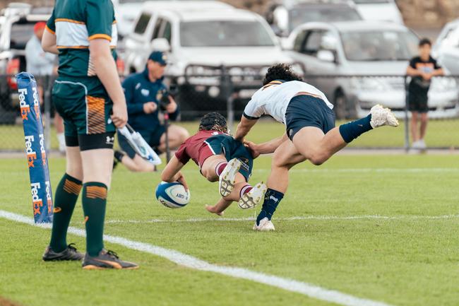 Isaac Fidock scores. Action from the round two game between the Reds and Brumbies. Picture courtesy of ACT Brumbies Media.