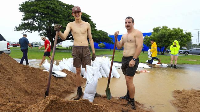 Residents collect sand bags at Lou Litster Park over the weekend. Pics Adam Head