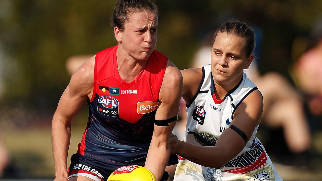 Harriet Cordner of the Demons and Danielle Ponter of the Crows in action during the 2019 AFLW Round 7 match.