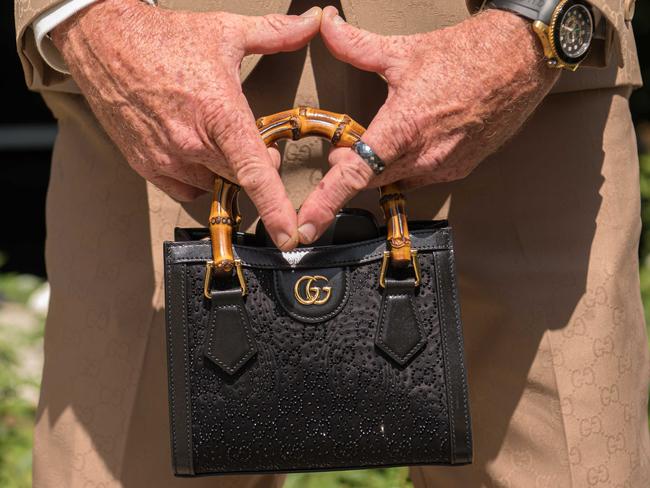 Men found creative ways to personalise their suits with accessories. Picture: NCA NewsWire / Flavio Brancaleone