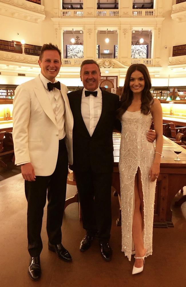 MC Mike Larkan with the happy couple. Picture: Instagram