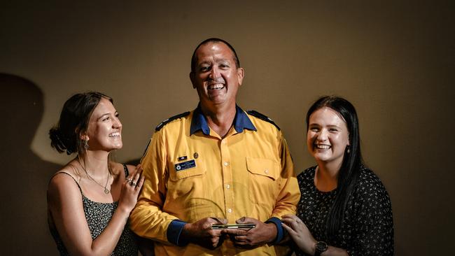 Georgia and Chloe Campbell give dad Scott a hug after he was named the Clarence Valley Council Australia Day Local hero. Photos: Adam Hourigan