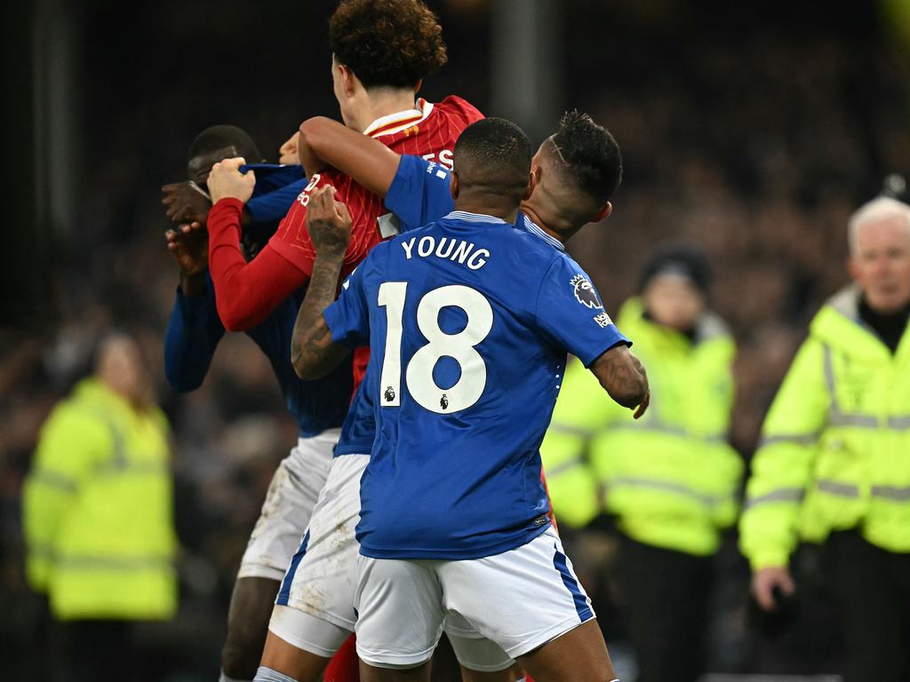 Abdoulaye Doucoure and Jones clash.