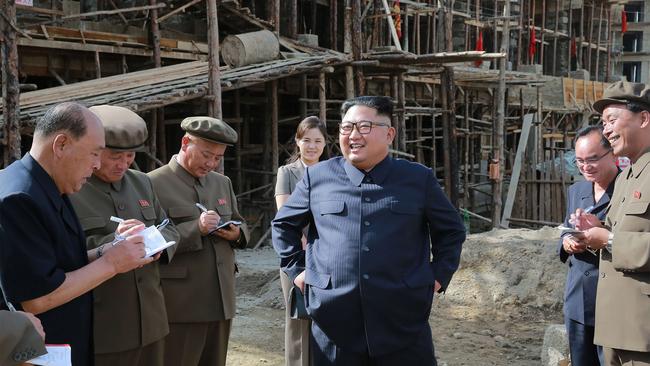 Kim Jong-un and wife Ri Sol-ju inspect a construction site in Ryanggang province. Picture: KCNA/AFP