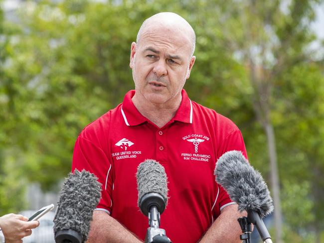 Torrin Nelson, advanced care paramedic and United Voice delegate, holds a press conference outside Princess Alexandra Hospital yesterday. Picture: Richard Walker/AAP