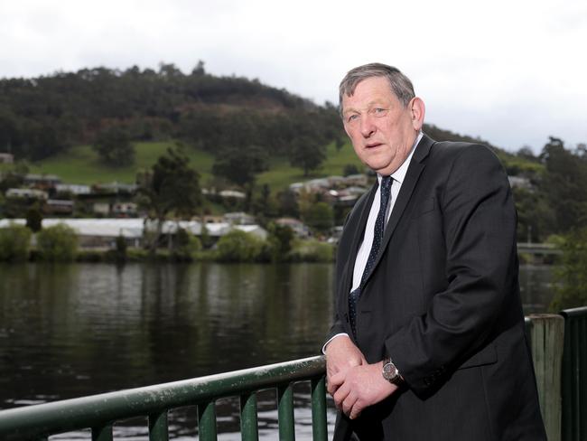 Former Huon Valley Council Mayor Peter Coad standing on the banks of the Huon River. Picture: LUKE BOWDEN