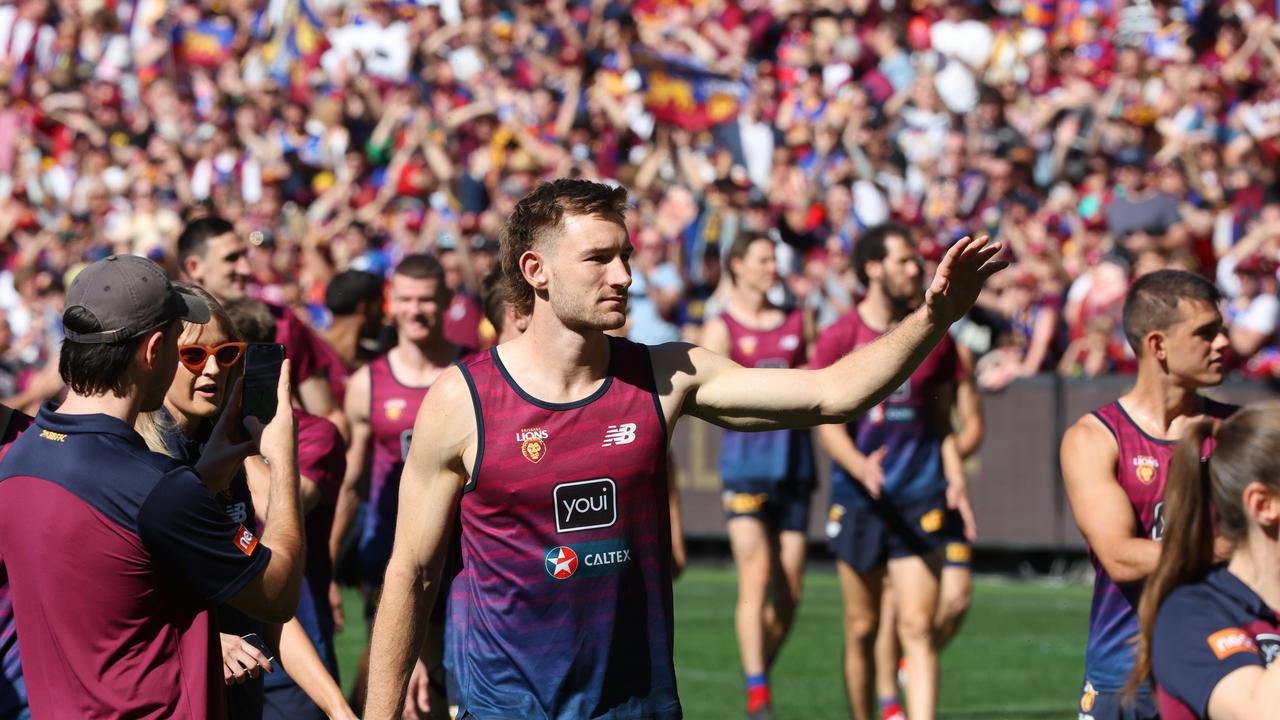 Harris Andrews thanks Lions fans at the MCG. Picture Lachie Millard.