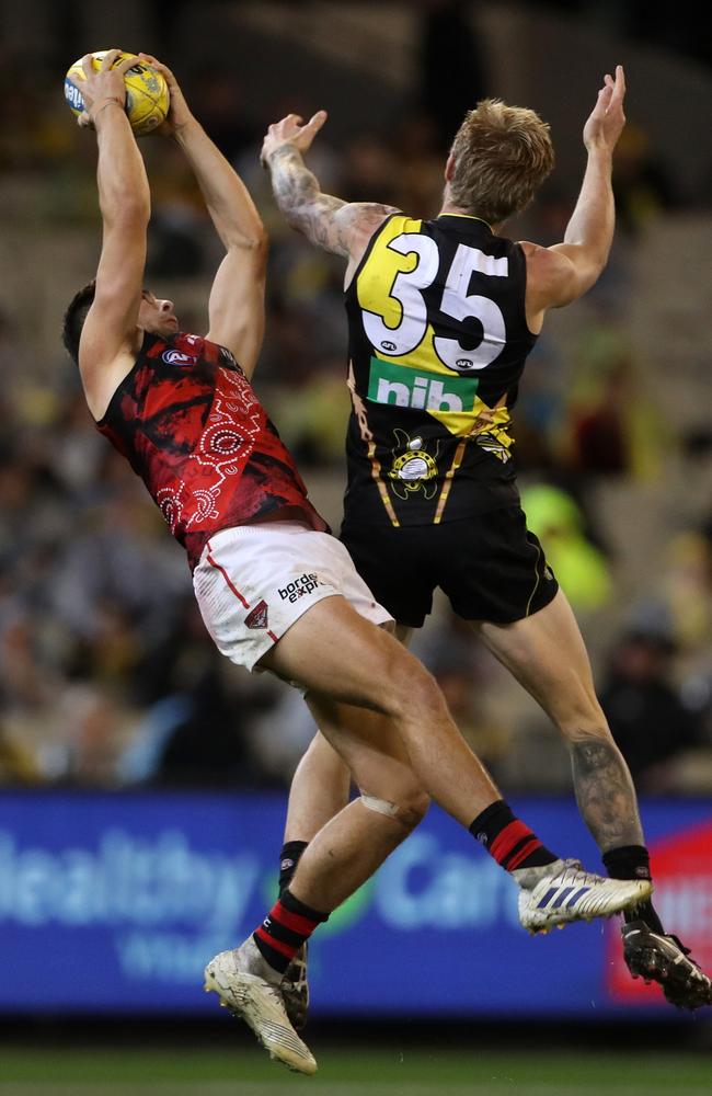 Kyle Langford reels in a tough mark despite the wet conditions. Picture: AAP Image/Mark Dadswell.