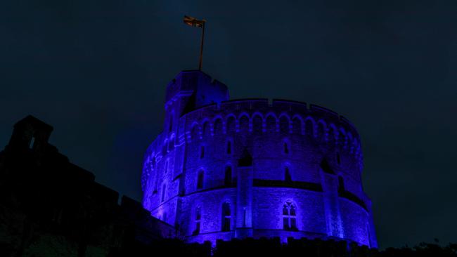 Windsor Castle goes blue to mark the 72nd anniversary of Britain's National Health Service on Sunday. Picture: AFP