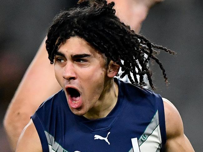 MELBOURNE, AUSTRALIA - JULY 14: Isaac Kako of Victoria Metro celebrates kicking a goal during the 2024 Marsh AFL Championships U18 Boys match between Victoria Metro and Victoria Country at Marvel Stadium on July 14, 2024 in Melbourne, Australia. (Photo by Josh Chadwick/AFL Photos)