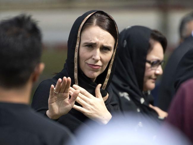 (FILES) In this file photo taken on March 22, 2019, New Zealand's Prime Minister Jacinda Ardern gestures as she departs following a gathering for congregational Friday prayers and two minutes of silence for victims of the twin mosque massacre, at Hagley Park in Christchurch. - New Zealand Prime Minister Jacinda Ardern announced on January 19, 2023 she will resign next month. (Photo by Marty MELVILLE / AFP)