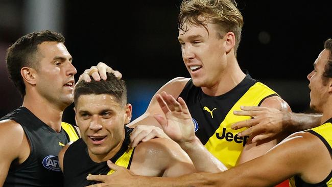 GOLD COAST, AUSTRALIA - OCTOBER 09: (L-R) Jack Graham, Dion Prestia, Tom J. Lynch and Daniel Rioli of the Tigers celebrate during the 2020 AFL Second Semi Final match between the Richmond Tigers and the St Kilda Saints at Metricon Stadium on October 09, 2020 in the Gold Coast, Australia. (Photo by Michael Willson/AFL Photos via Getty Images)