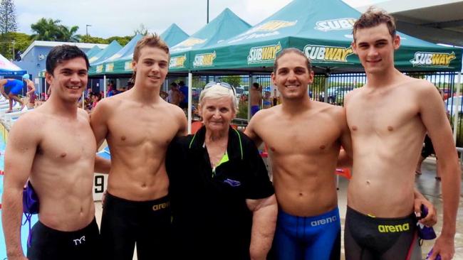 Pat Wright (centre) with Mackay Swimming Academy's (from left): Darcy Hargreaves, Jake Mezen, Adam Smit and Tom Henderson. The MSA team broke a 14-year Swimming North Queensland record in the 4x100m Open Men's Medley Relay. Picture: Contributed