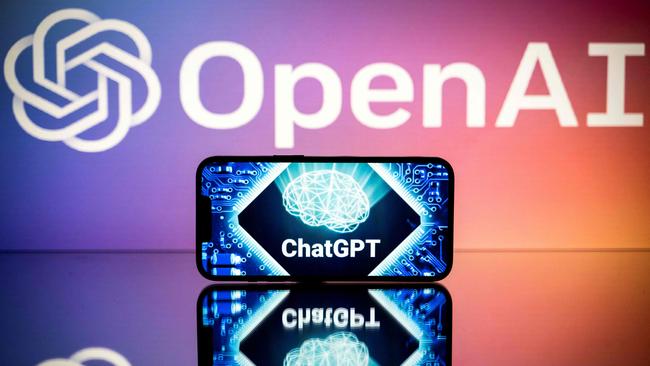 Screens display the logos of OpenAI and ChatGPT. Picture: AFP